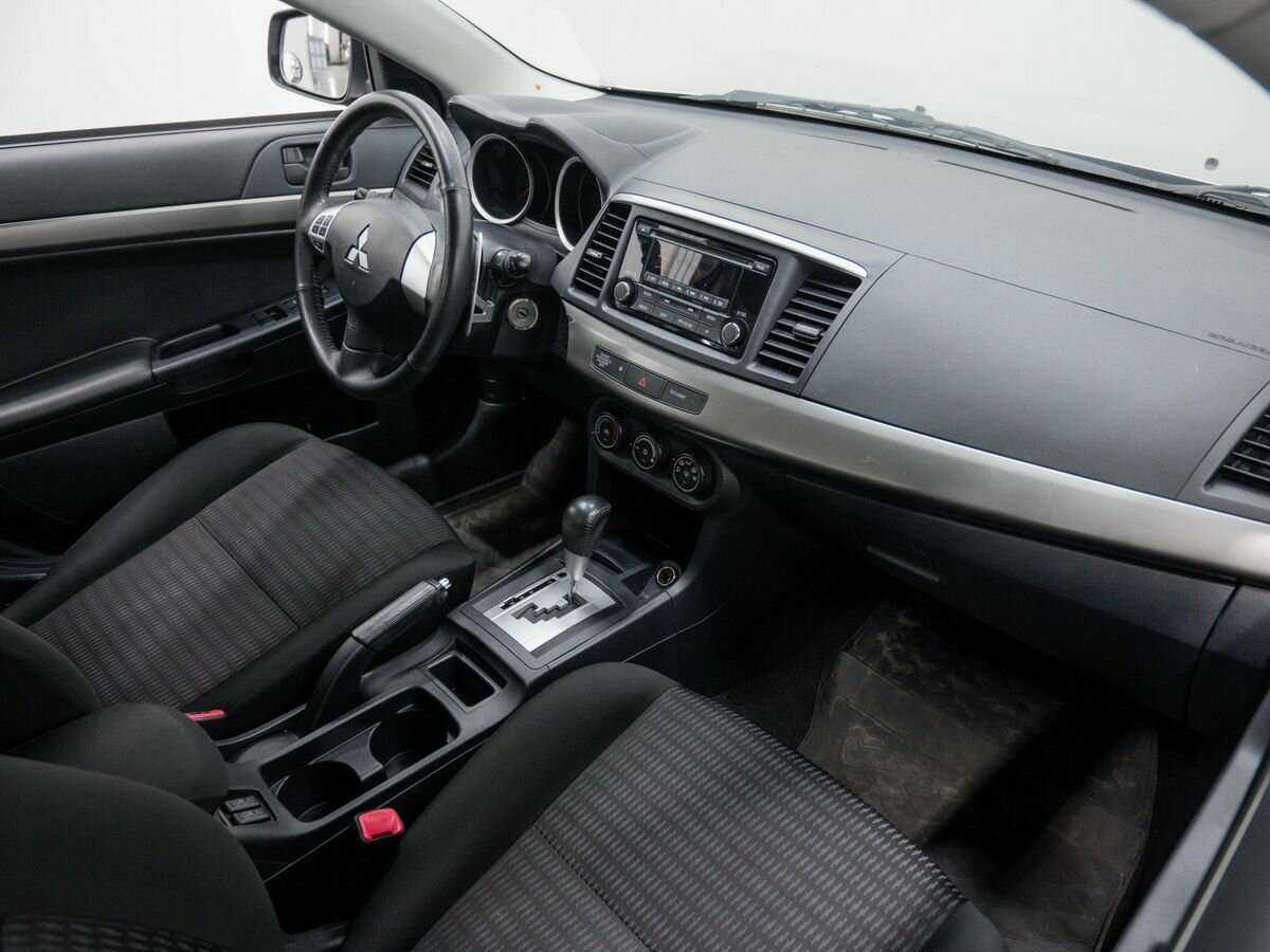 Купить Mitsubishi Lancer с пробегом. Фото: #4