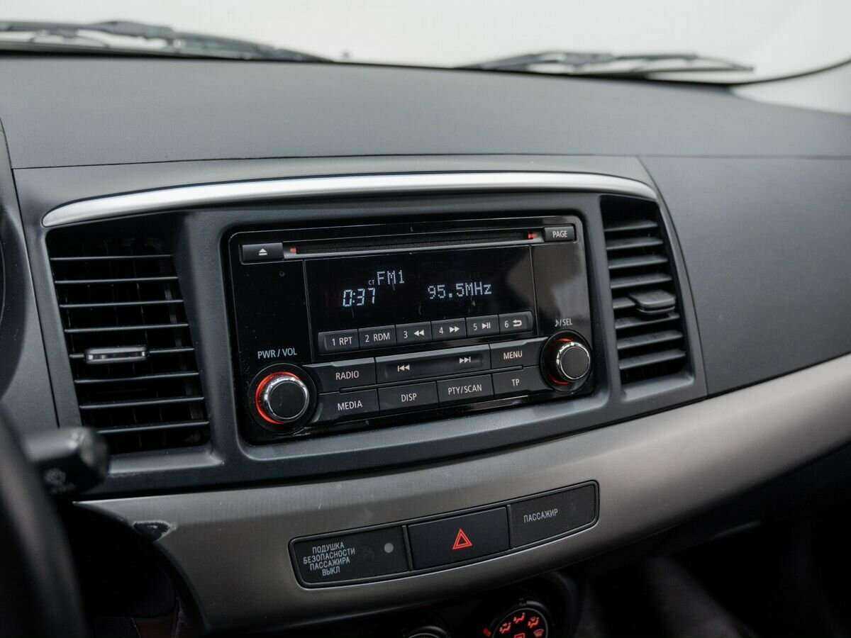 Купить Mitsubishi Lancer с пробегом. Фото: #15