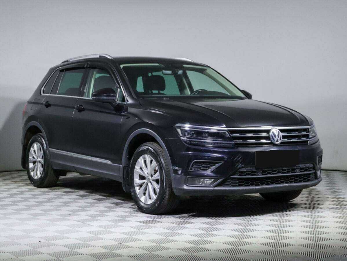 Купить Volkswagen Tiguan с пробегом. Фото: #2