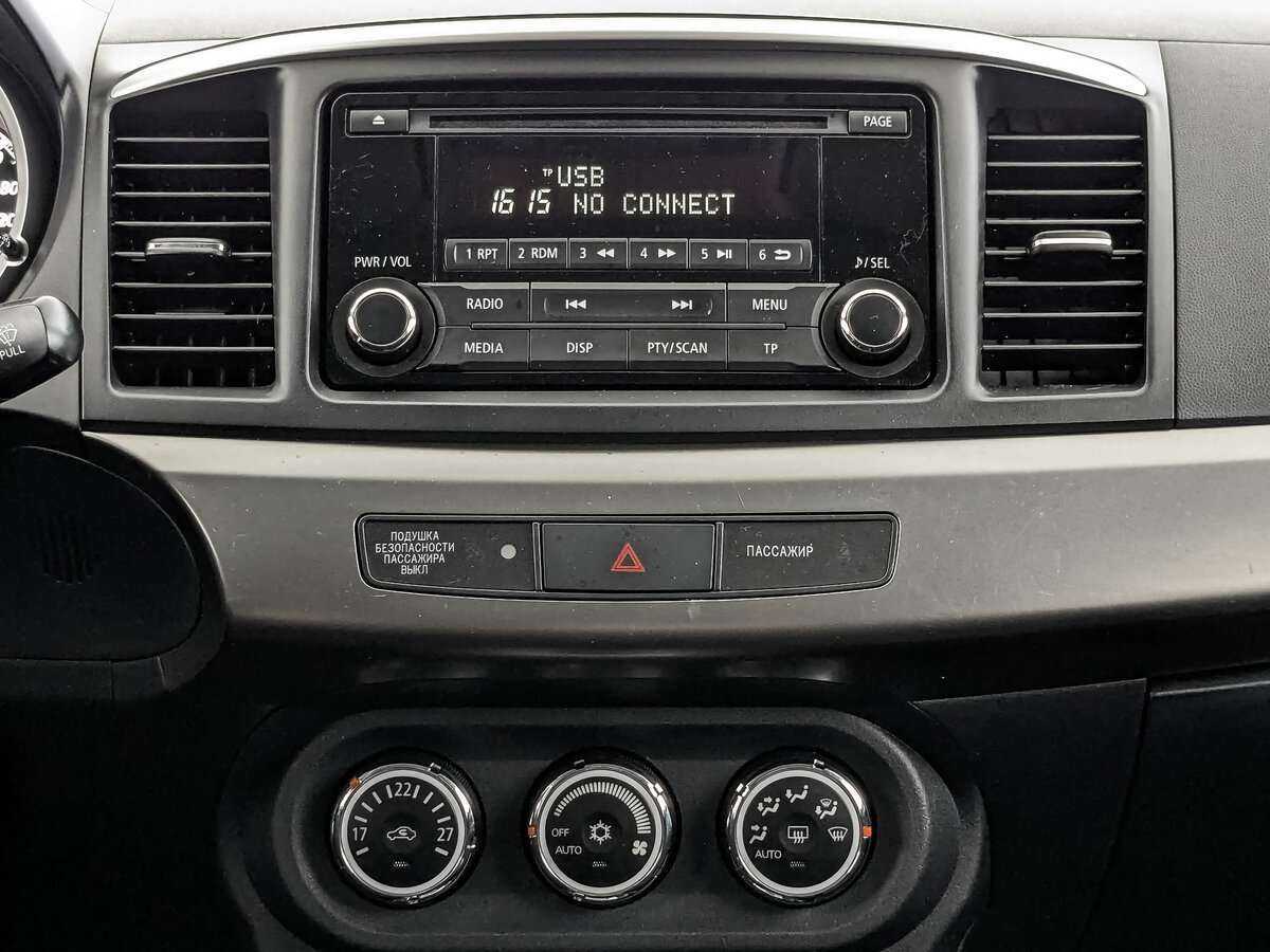 Купить Mitsubishi Lancer с пробегом. Фото: #11