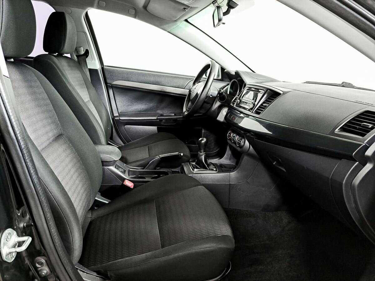 Купить Mitsubishi Lancer с пробегом. Фото: #9